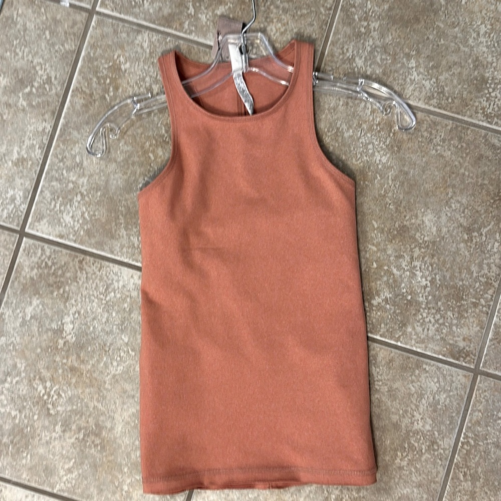 Free People movement Athletic Canyon Tank with Criss Cross back straps. Peach XS